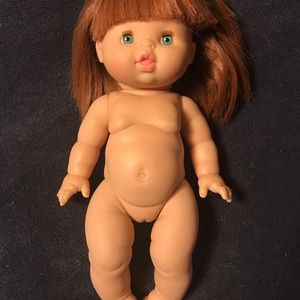 Minikane Baby Doll, red hair with green eyes